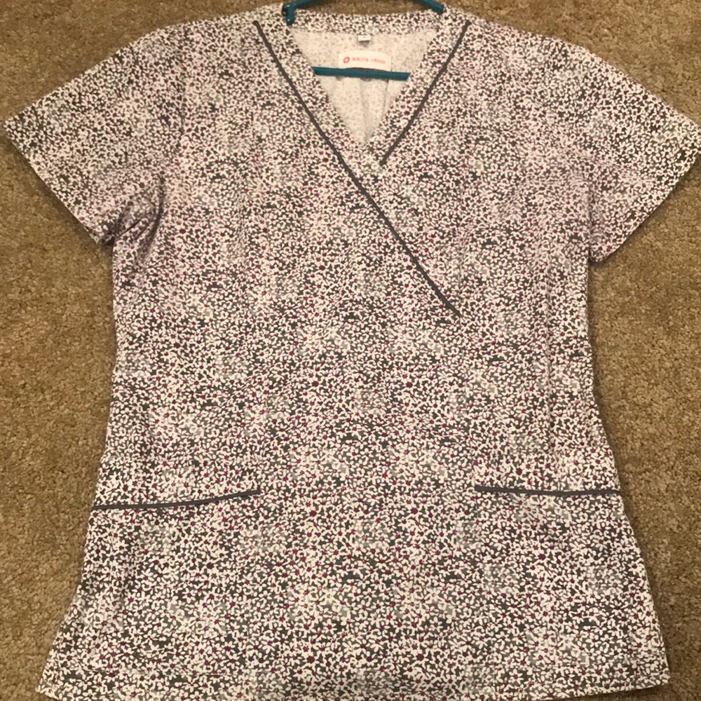 White cross gray and purple scrub top